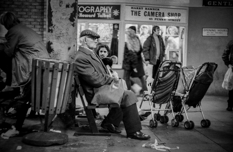 People sitting between the two markets - Blackburn a Town and Its People