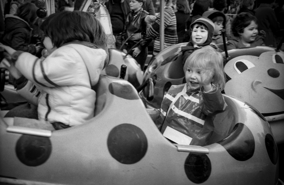 Child Waving To Parents At Blackburn Easter Fair, Blackburn Child Waving To Parents At The Easter Fair - Blackburn a Town and its People Photographic Study
