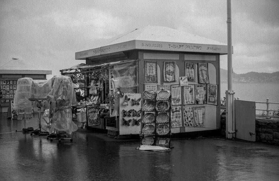 Pier Stall in rain, Llandudno 1992 - From British Coastal Resorts - Photographic Essay by Chris Ball Pier Stall in rain, Llandudno 1992 - From British Coastal Resorts - Photographic Essay by Chris Ball